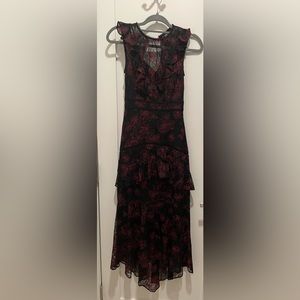 A stunning tiered black and maroon floral lace dress by Ever New.
